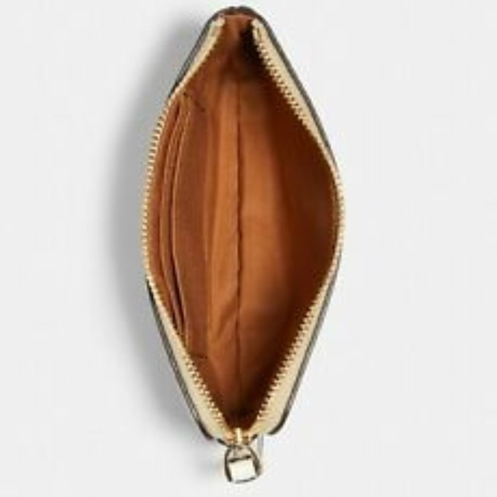 CORNER ZIP WRISTLET IN SIGNATURE CANVAS WITH HEART - Picture 3 of 5